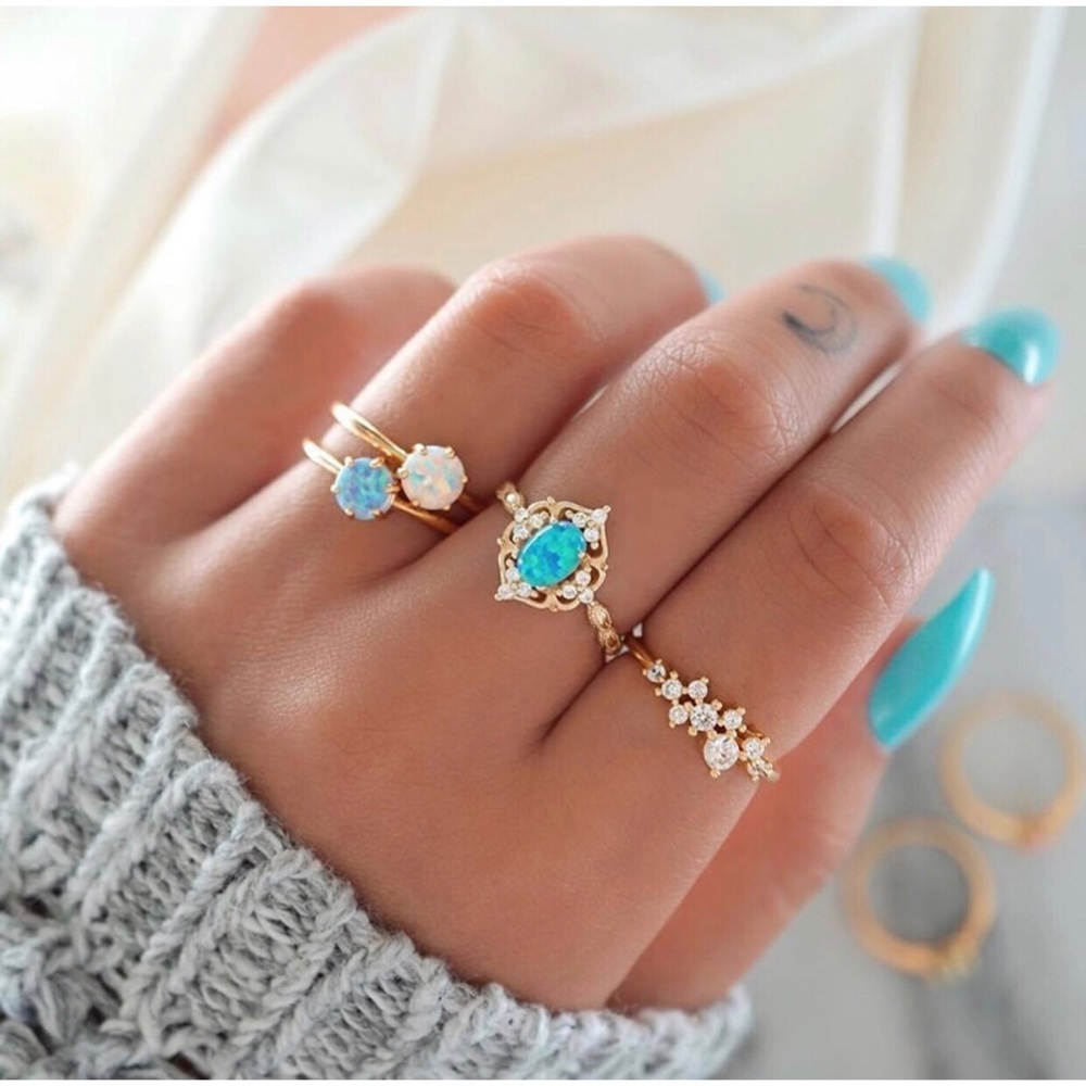 Gold & Faux Blue Topaz 4 Piece Ring Set
